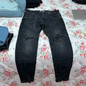 black ripped jeans